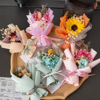 Flower bouquet car vent clip air freshener on car dashboard