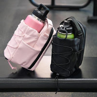 Pink and black magnetic bottle sling gym bags side by side